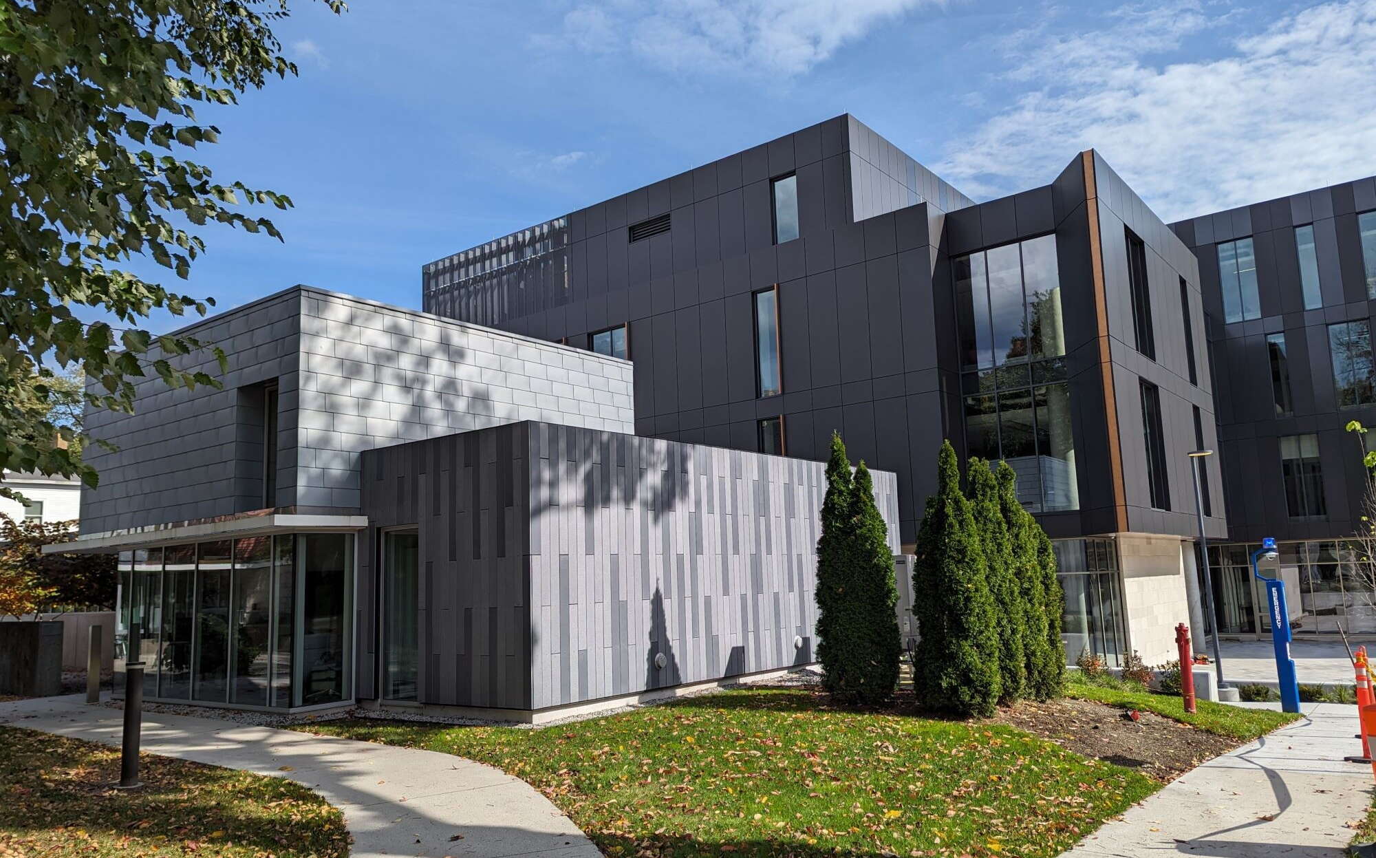 Two gray contemporary buildings