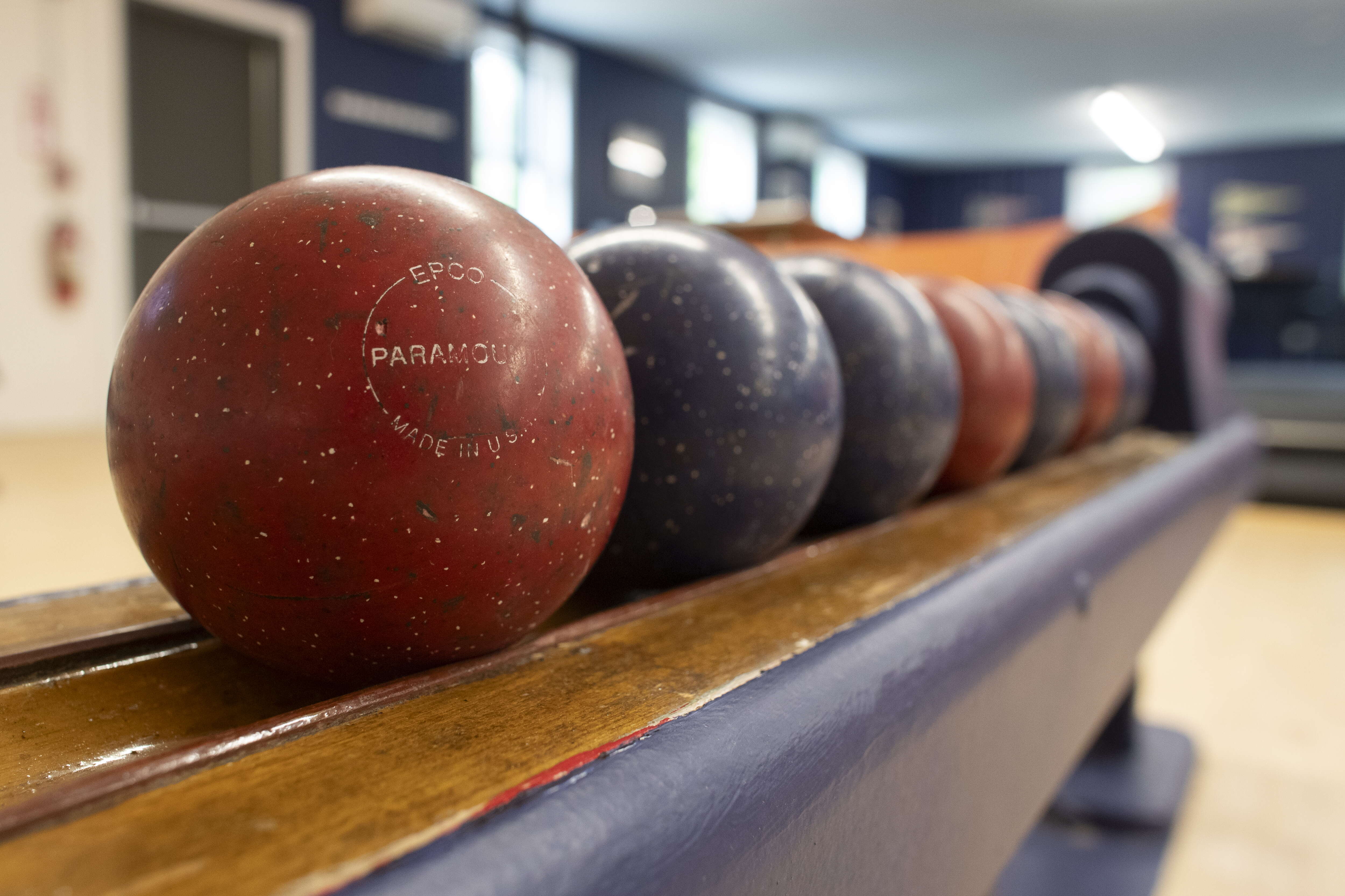 A line of candlepin bowling balls