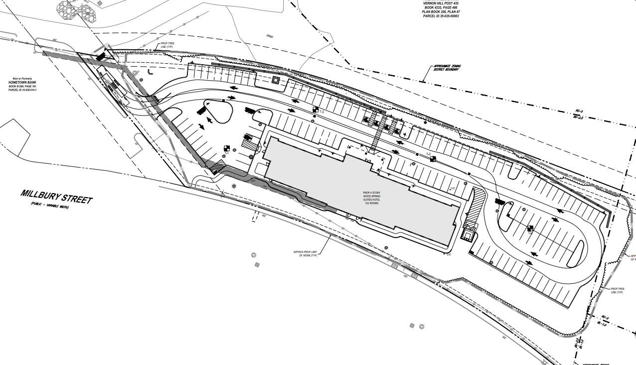 Blueprints for a parcel containing a four-story hotel