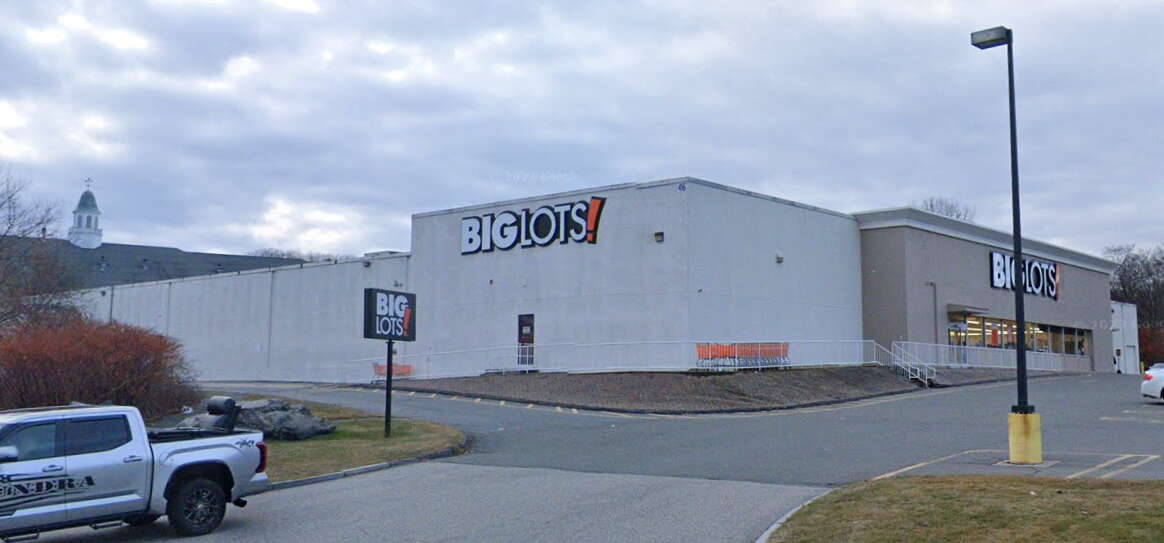 White exterior of a large big box retail store