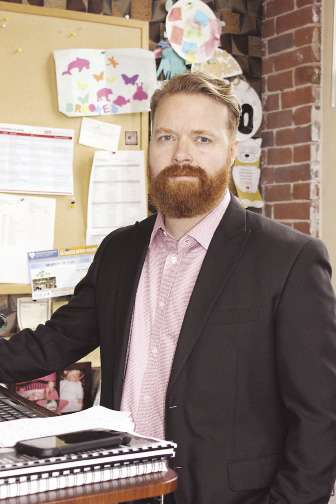 WBJ editor Brad Kane at his desk