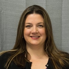 A headshot photo of CARLY ANTONELLIS