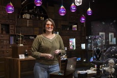 A person stands in a jewelry store