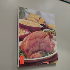 Canvas photo of a rotisserie chicken and sides