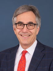 Man in suit with glasses