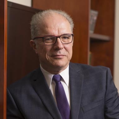 Man in suit with glasses