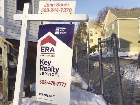 A sign advertising a condo for sale in Worcester