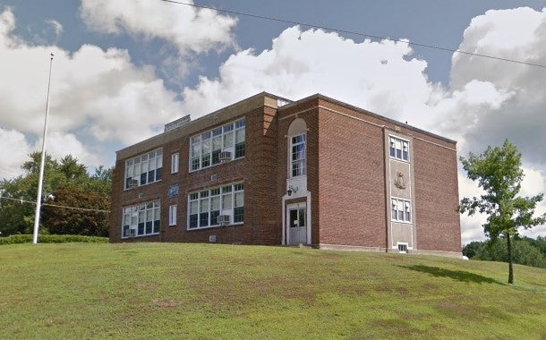 Mixed income senior housing development in former school building