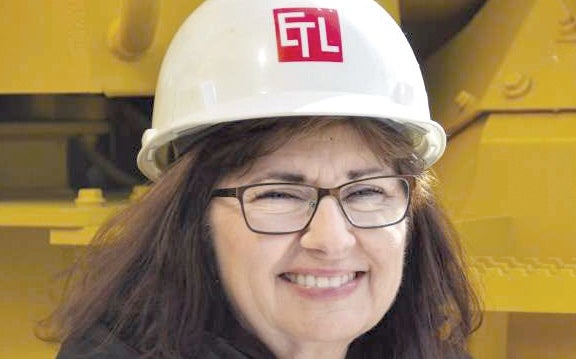 woman wearing white hard hat