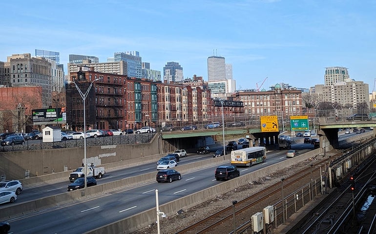 The Mass Pike in Boston with the city skyline in the background