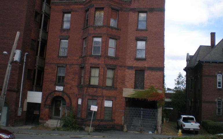 A large red brick building.
