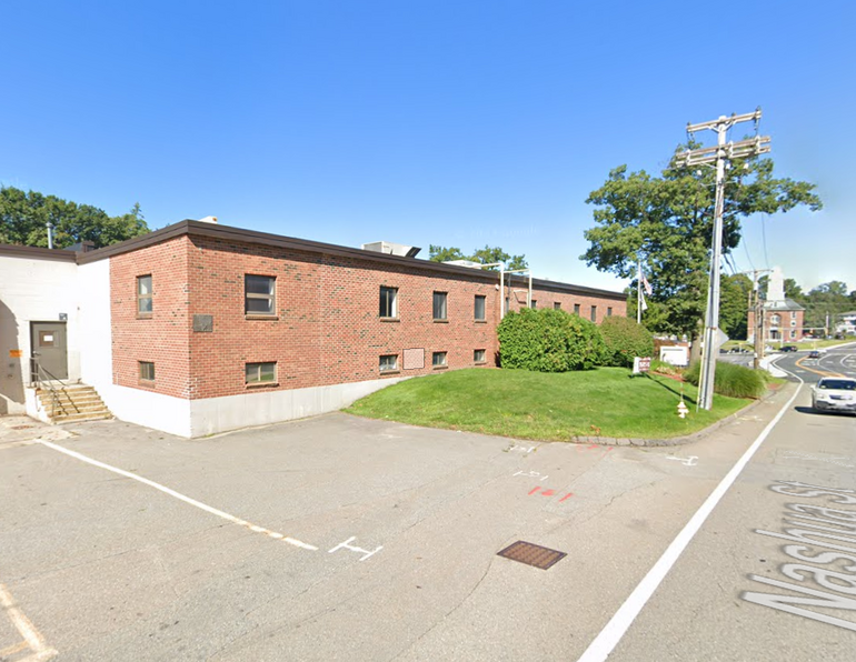 A large industrial building with a brick facade.