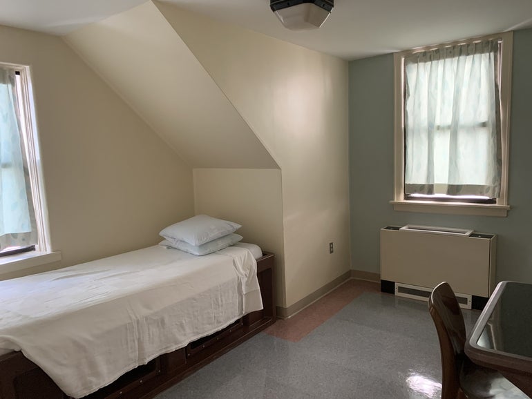 A bed in a room at a hospital