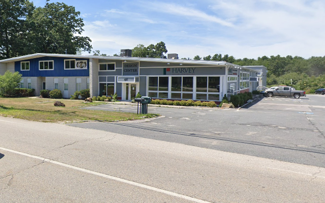 A single story blue building