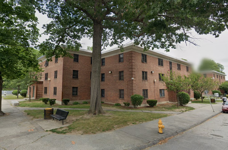 A brick public housing building