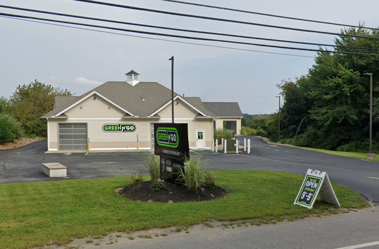 A car wash that has been converted into a drive-through recreational cannabis store
