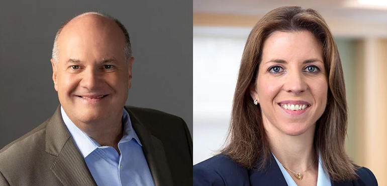 A man in a suit and a woman