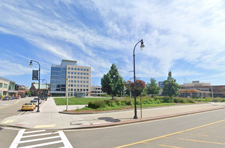 A grassy area in an urban setting