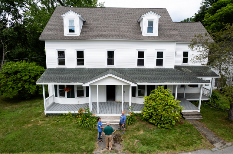A two story white house