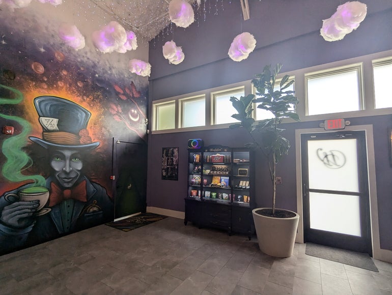 A dispensary with a mural painted on the wall
