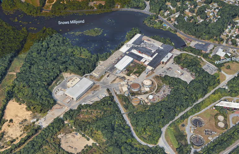 An aerial satellite image of a factory