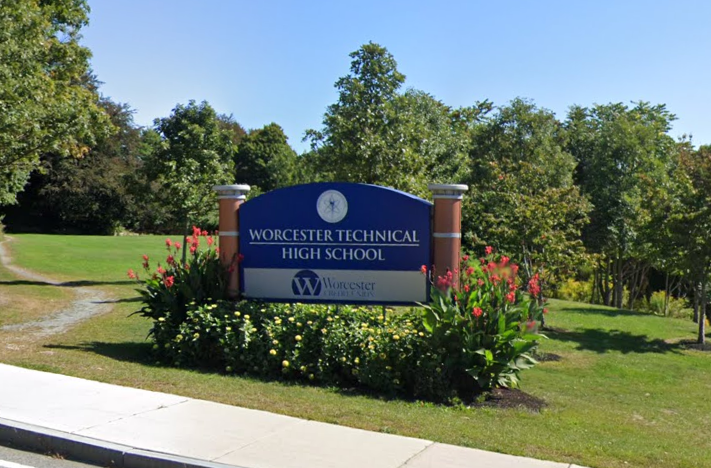 A large blue sign for Worcester Technical High School