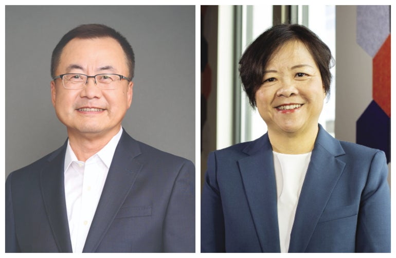 Side-by-side headshots of a man on the left and a woman on the right. Both wear blue suit jackets and white tops.