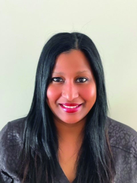 Woman with black hair in black shirt