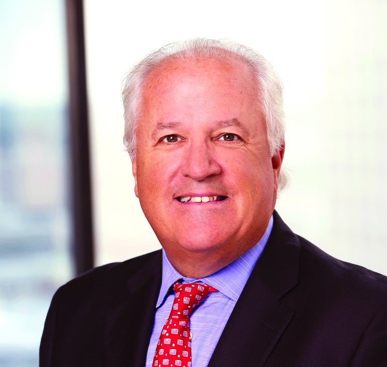 Man in suit with red tie