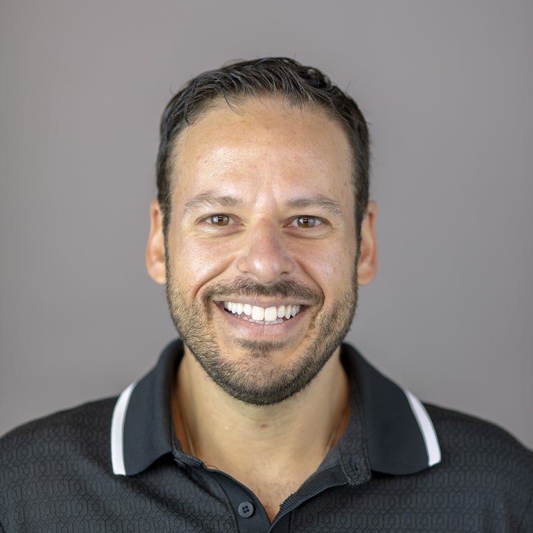 Man in black polo