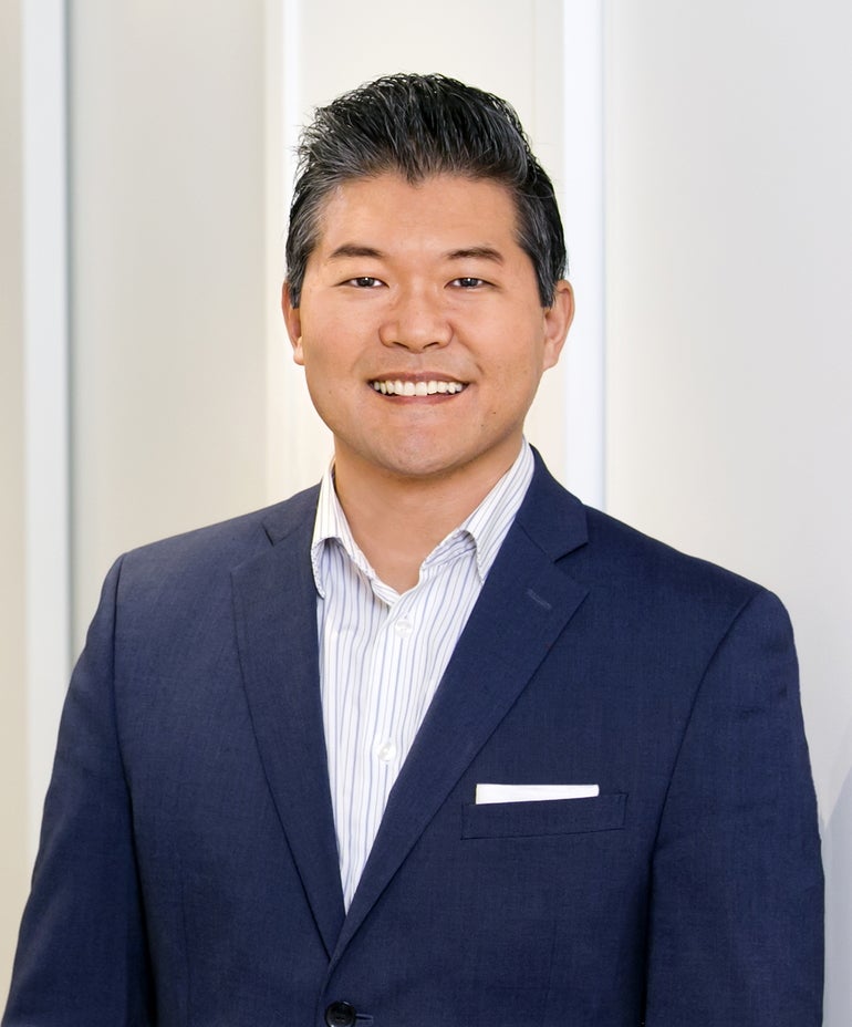 Man in dark blue suit