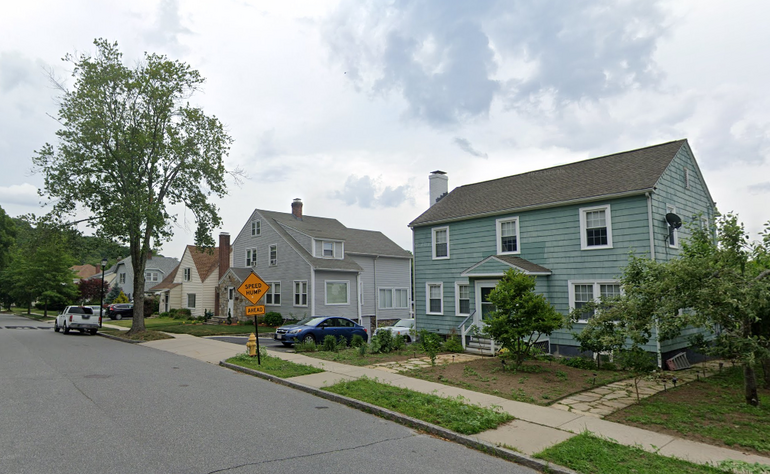 A row of single-family homes along a street