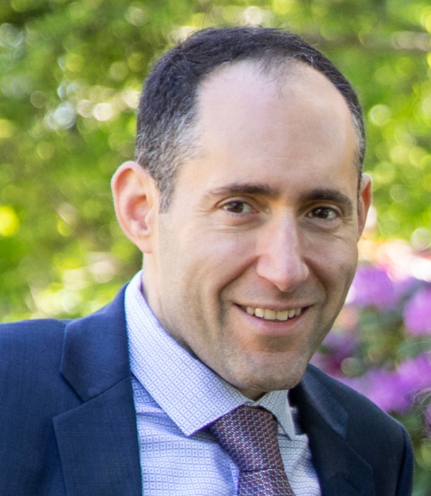 Portrait photo of a man in a suit