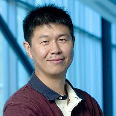 Man in maroon polo shirt