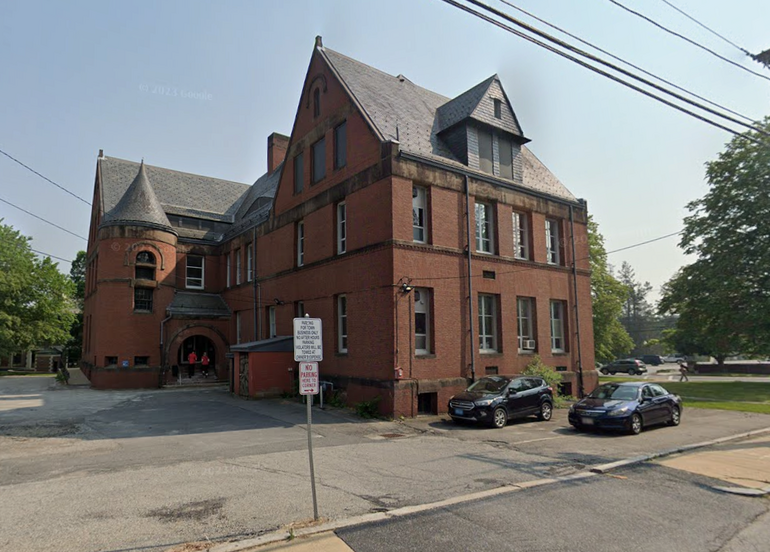 Three-story brick school building