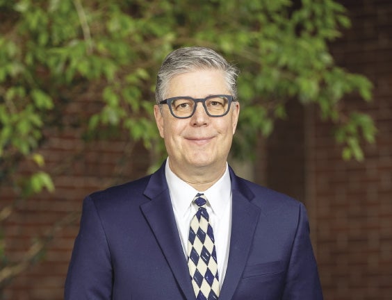 Man in suit with glasses