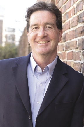 Man in suit with light blue dress shirt