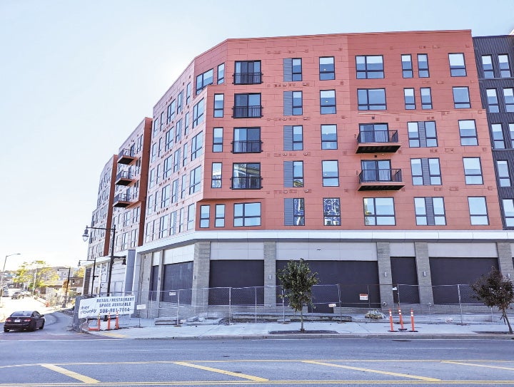 An outside photo of The Revington housing complex in Worcester