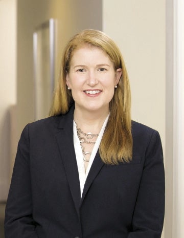 A woman in a suit