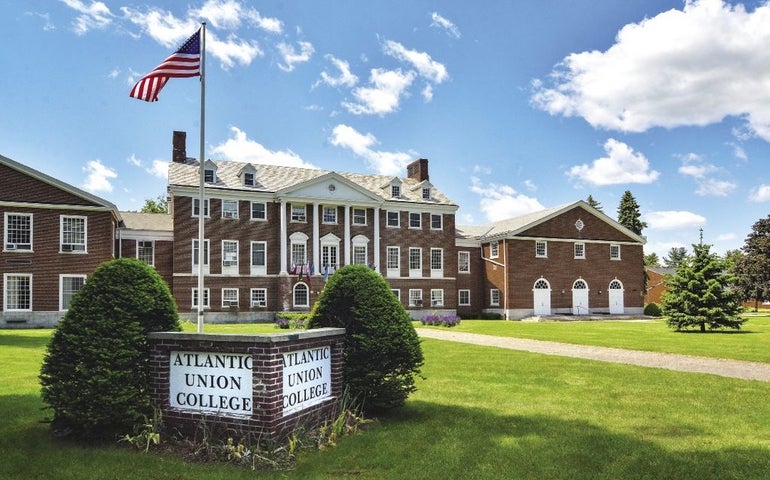 A college building with signage in front