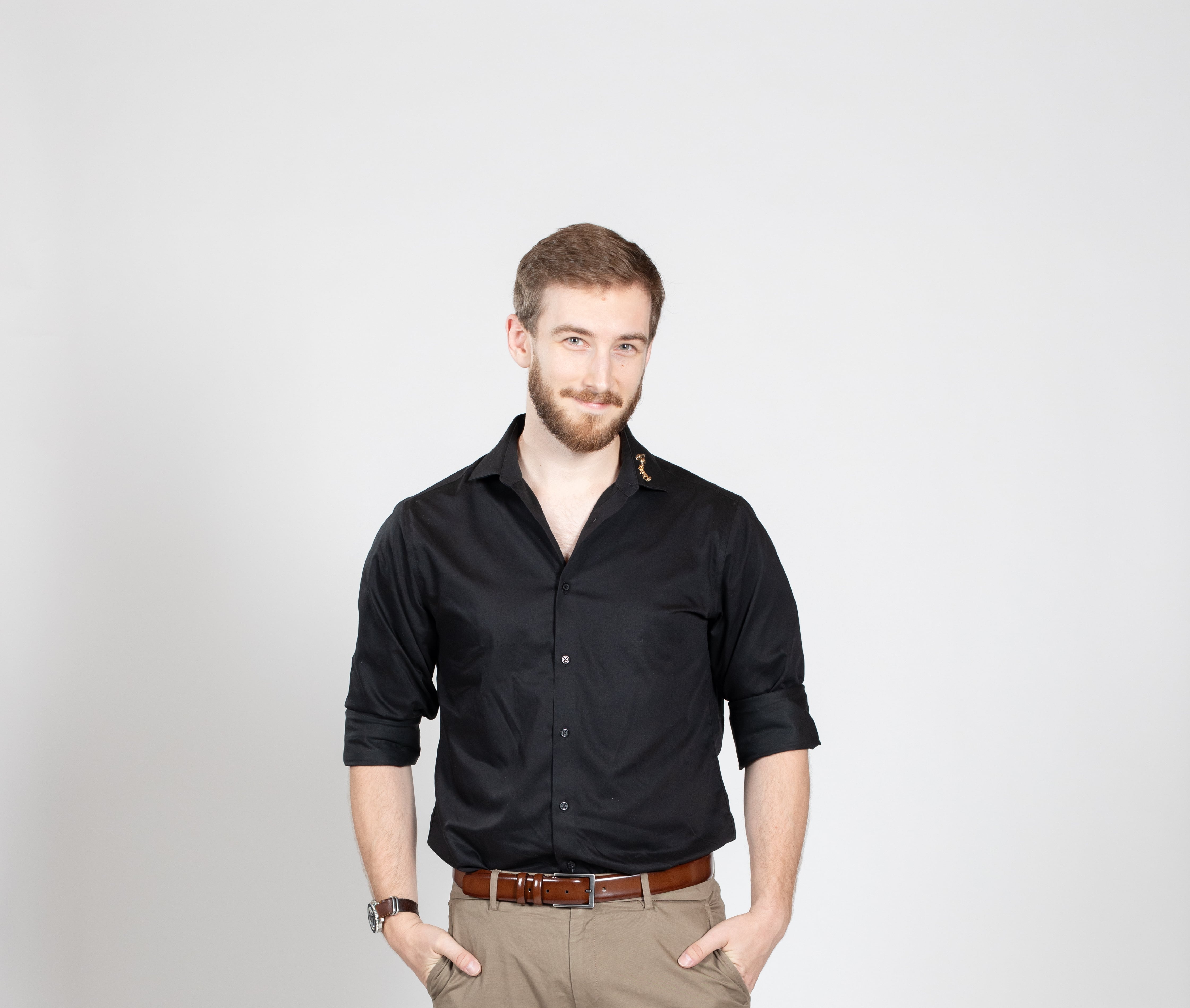 Man in black dress shirt gives double thumbs up