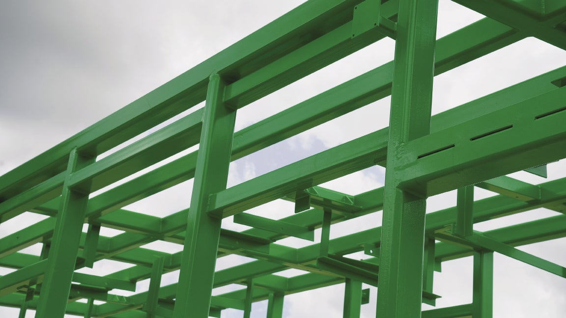 A structure made of green steel beams